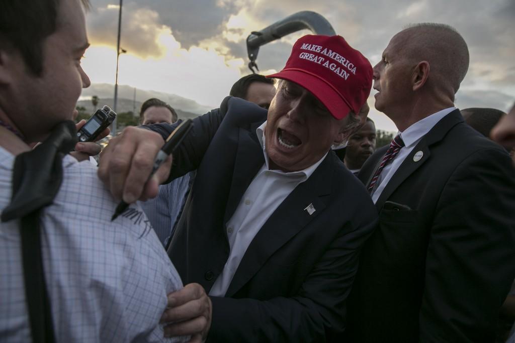 Republican presidential hopeful Donald Trump stops to give an autograph after speaking to supporters aboard the USS Iowa battleship in Los Angeles on Tuesday, Sept. 15, 2015. (Robert Gauthier/Los Angeles Times/TNS)