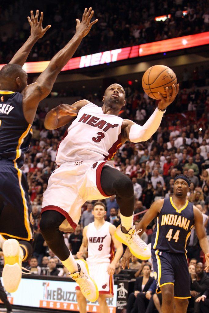 Miami Heats Dwyane Wade goes to the basket to tie the game during the fourth quarter on Monday, Jan. 4, 2016, at AmericanAirlines Arena in Miami. (Hector Gabino/El Nuevo Herald/TNS)