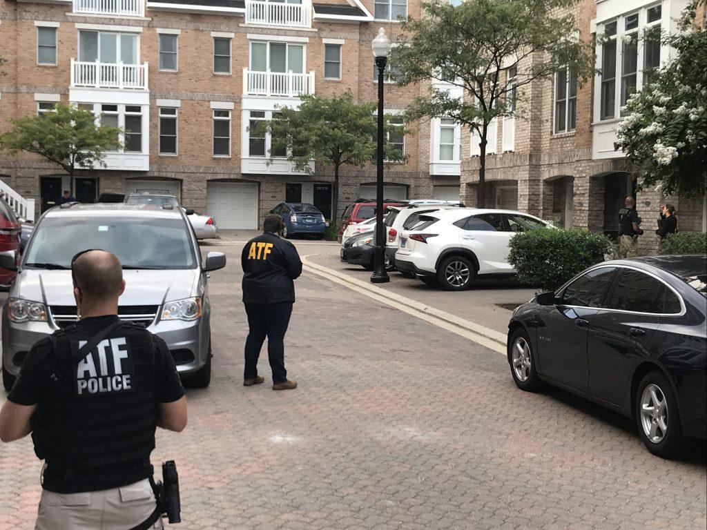 Federal authorities were at a home in Baltimores Inner Harbor on Sunday night, Aug. 26, 2018 as part of an investigation into the Jacksonville mass shooting. (Justin Fenton/Baltimore Sun/TNS)