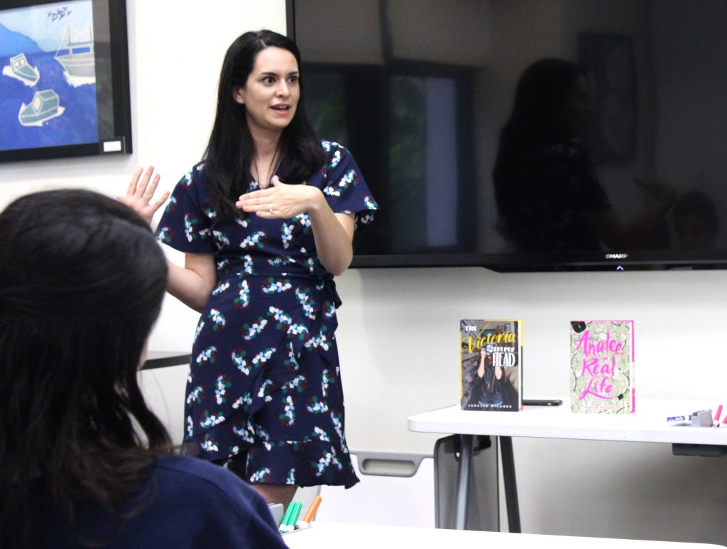 Young adult author Janelle Milanes spoke to English teacher Paige Vignolas class about her latest novel, Analee, in Real Life. Milanes also engaged students in a writing activity, and discussed the business of getting published.  Photo by Covan Blair.