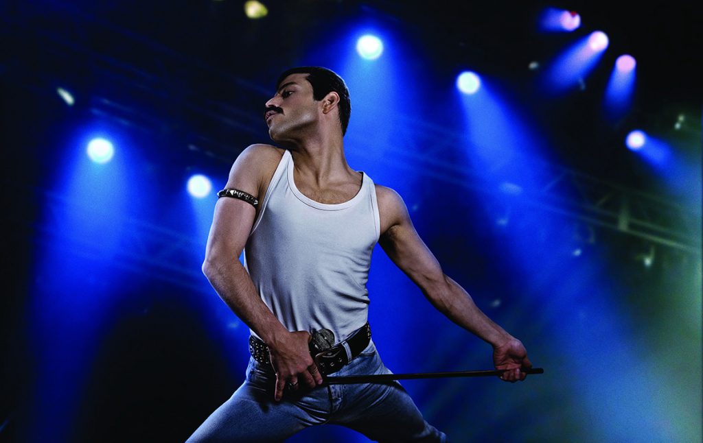 Rami Malek as rock icon Freddie Mercury in "Bohemian Rhapsody." The "Mr. Robot" star already bears a physical similarity to late Queen frontman Freddie Mercury, but with the right clothes and that famous 'stache, casual viewers may be hard-pressed to tell the difference. (Nick Delaney/Twentieth Century Fox)