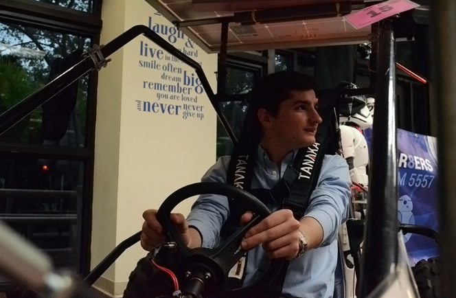 Bradley Riemer rides a go-kart he constructed.
