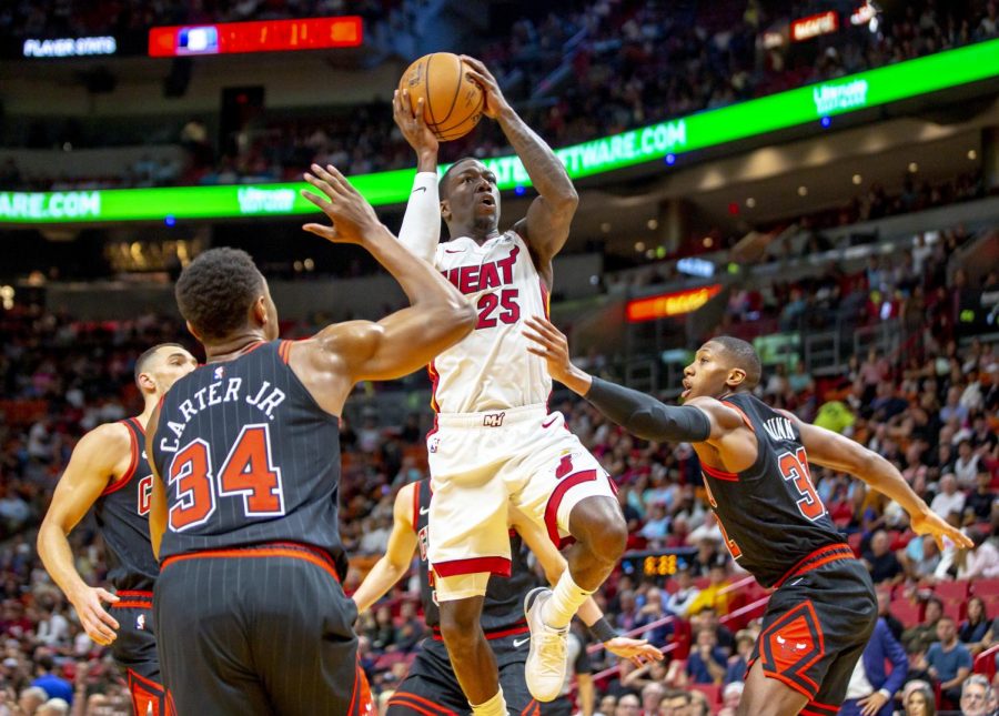 Miami Heat guard Kendrick Nunn (25) drives to the lane with the ball during the first quarter against the Chicago Bulls on Sunday, Dec. 8, 2019 at AmericanAirlines Arena in Miami, Fla. (Daniel A. Varela/Miami Herald/TNS)