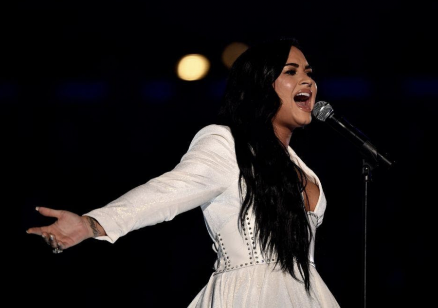 A visibly moved Demi Lovato belts "Anyone" at the Grammy Awards on Jan. 26, 2020, after choking up initially. [Robert Hanashiro/USA TODAY] 
USA
