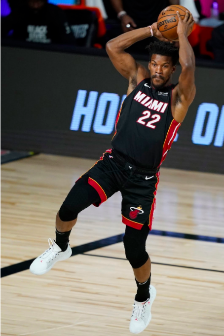 Jimmy Butler (22) of the Miami Heat passes against the Indiana Pacers during the second half of a first round playoff game on August 24, 2020 at The Field House at ESPN Wide World Of Sports Complex in Lake Buena Vista, Florida. 