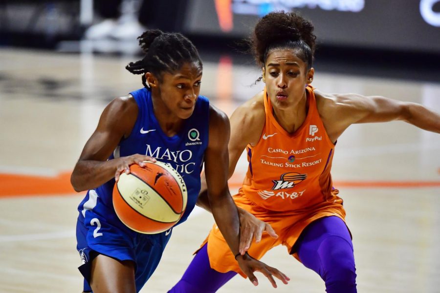 The Minnesota Lynxs Crystal Dangerfield, left, drives against Skylar Diggins-Smith of the Phoenix Mercury in Game 1 of a second-round playoff series at Feld Entertainment Center in Palmetto, Florida, on September 17, 2020. 