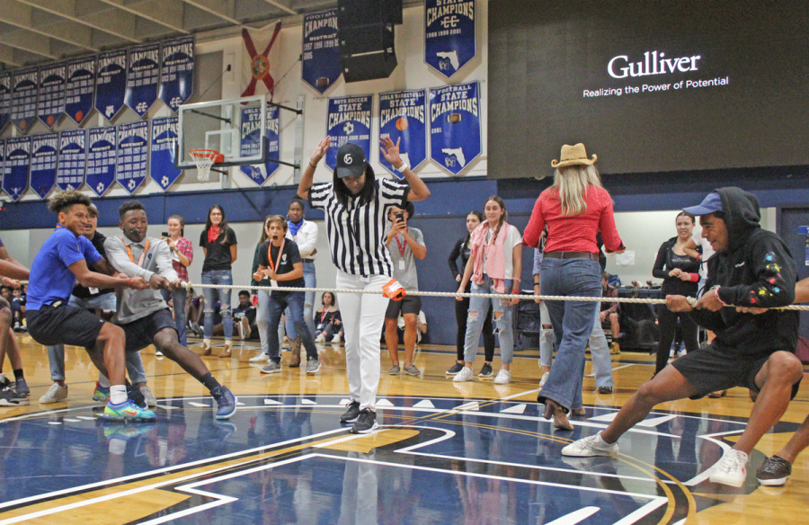 Assistant Principal Donna Lee referees a tug-of-war match during a pre-pandemic pep rally. A student-athlete in high school herself, Lee revels in school spirit.