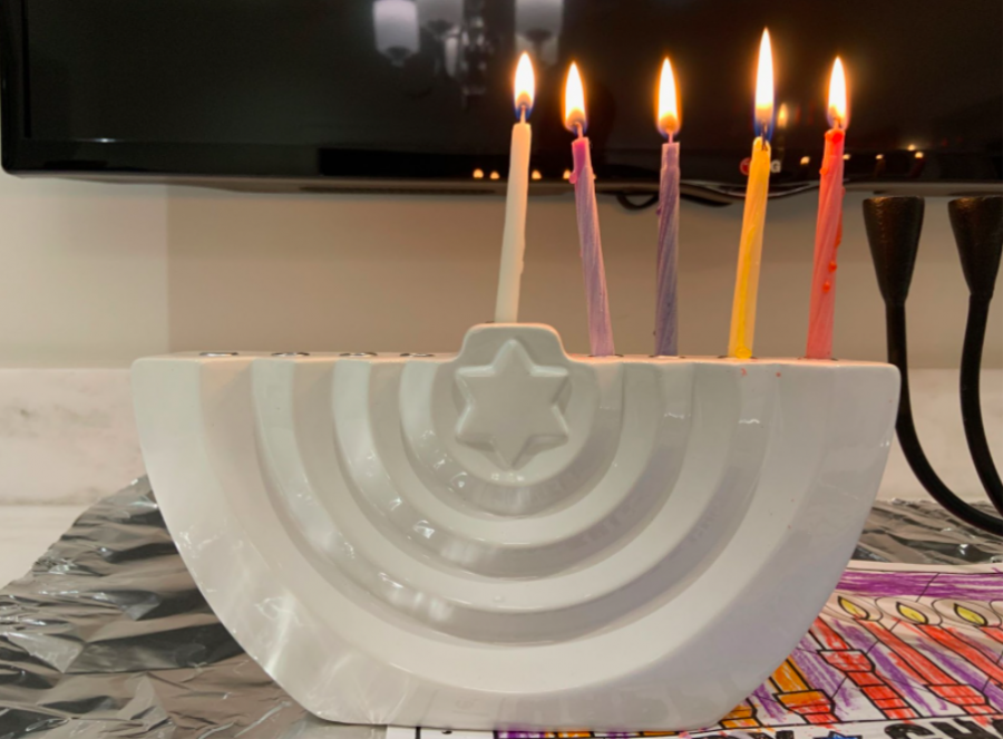 The menorah is the central tradition of celebrating Hanukkah, with eight candles representing eight nights. Those who celebrate the holiday light a candle each night surrounded by family.