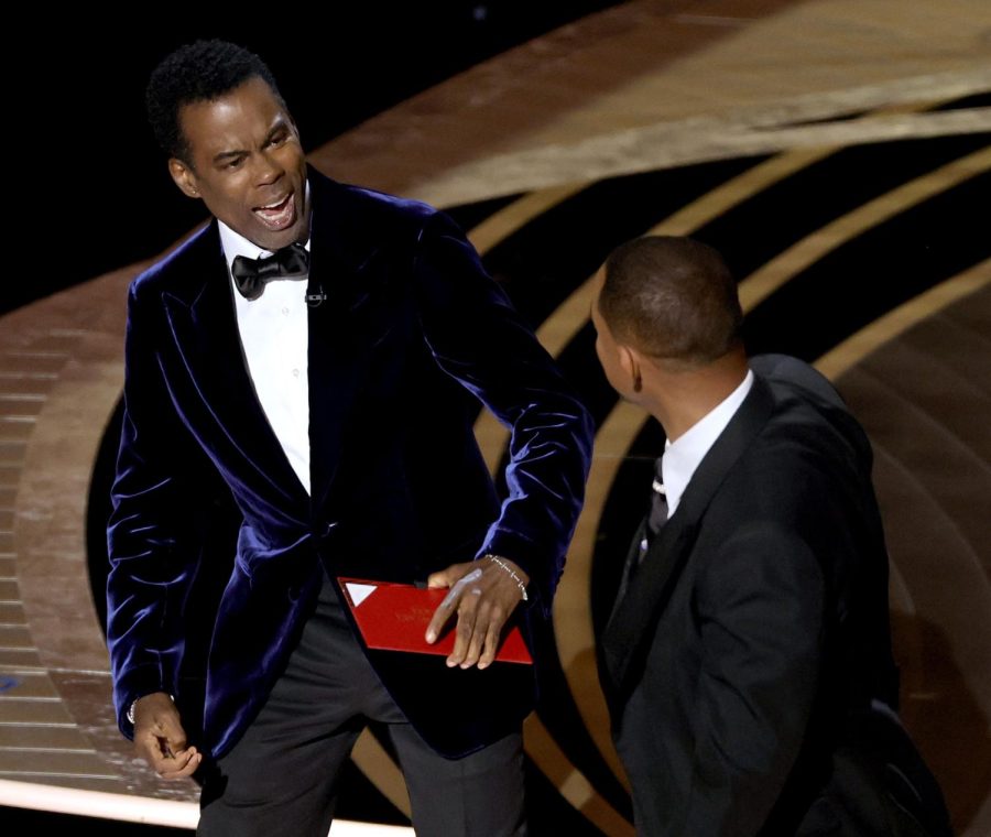 HOLLYWOOD, CA - March 27, 2022. Will Smith slaps Chris Rock onstage during the show at the 94th Academy Awards at the Dolby Theatre at Ovation Hollywood on Sunday, March 27, 2022.