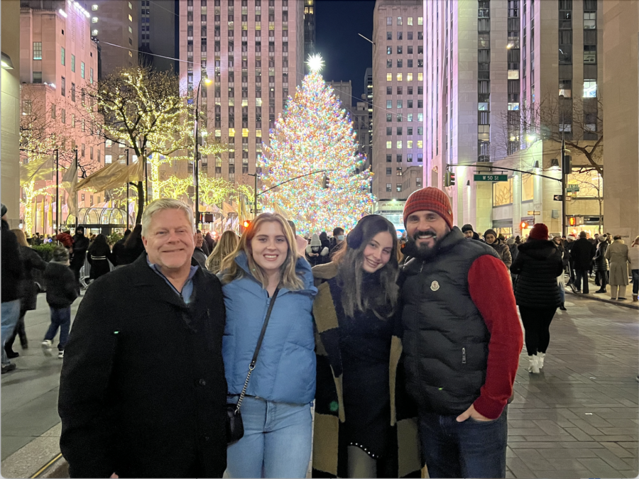 Claire+Russell+while+on+vacation+with+her+family+takes+a+picture+in+front+of+the+Rockefeller+Center+Christmas+Tree.