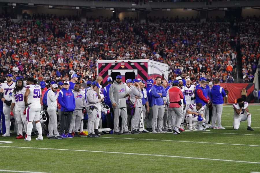 Buffalo Bills players look on after teammate Damar Hamlin (3) collapsed on the field after making a tackle against the Cincinnati Bengals during the first quarter at Paycor Stadium on Monday, Jan. 2, 2023, in Cincinnati.
