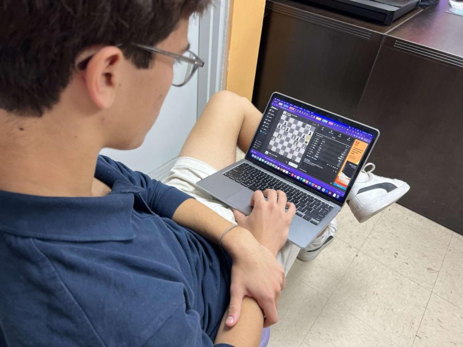 A Chess Club member plays on chess.com after the sport saw a massive skyrocket in popularity among high schoolers.