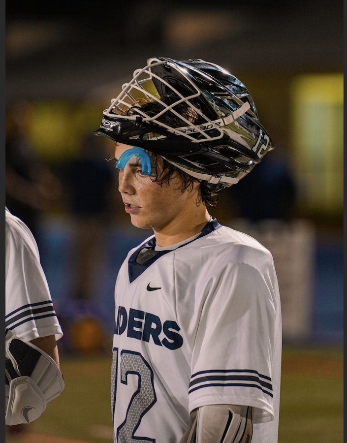 Starting attackman, Hoban Noyes gets prepared to take on Gulliver rivals Belen at Tropical Park during Friday night lights. (DloFilms)