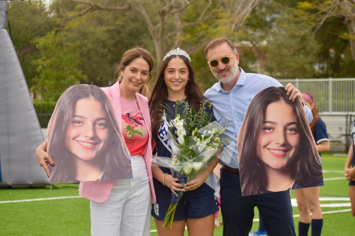 Luciana Hornstein and her parents pose for a photo. Bidding farewell to their high school careers, Senior Day served as a culmination of years of hard work, teamwork, late practices, and games. Not only did fellow players and coaches join the event, but also the proud parents of the senior players.