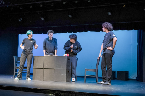 From left to right: Alan Basterra, Sebastian Ulloa, Ethan Artzt, and Sam Levinger perform “Controlling Interests” by Wayne Rawley. The show was a chance for Troupe 2450 to perform their competition pieces stress-free. “Most of the prep was just like, reviewing what we had done, applying some of the notes that the judges had given to us,” said junior Samuel Levinger.

