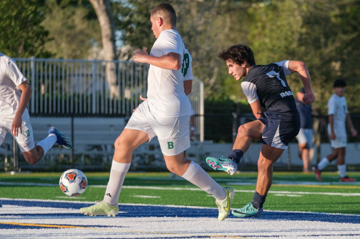 Senior Daniel Ortiz scores a winning goal. Three goals were scored in overtime causing the Raiders to win. They are now in the district finals. 