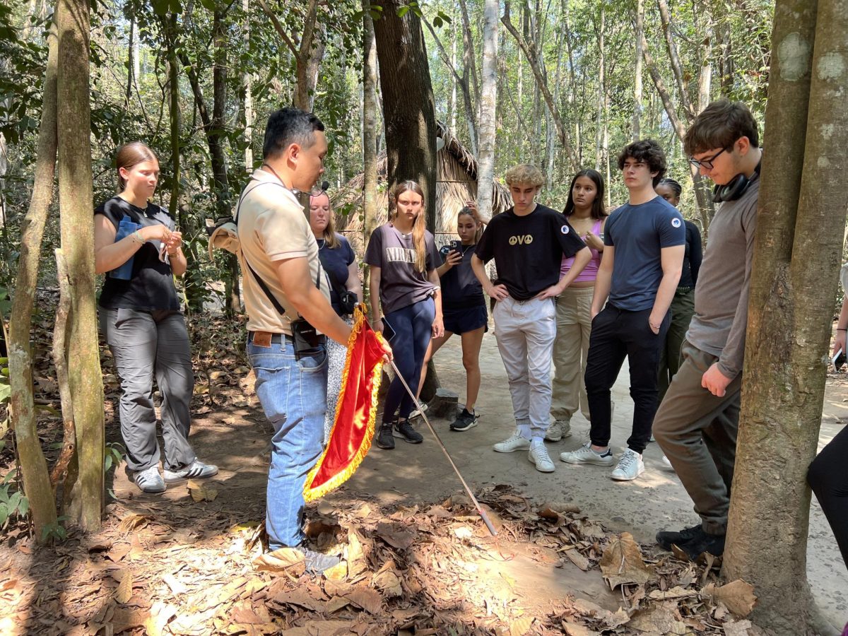 Students+learn+about+the+booby+traps+near+the+Cu+Chi+Tunnels+in+Ho+Chi+Minh+City.+Students+learned+about+the+Vietnam+War+through+a+new+perspective.+They+visited+the+Cu+Chi+Tunnels+to+learn+about+Vietnamese+war+tactics+used+during+the+war+and+they+also+visited+the+War+Remnants+Museum+to+learn+about+the+wars+aftermath.