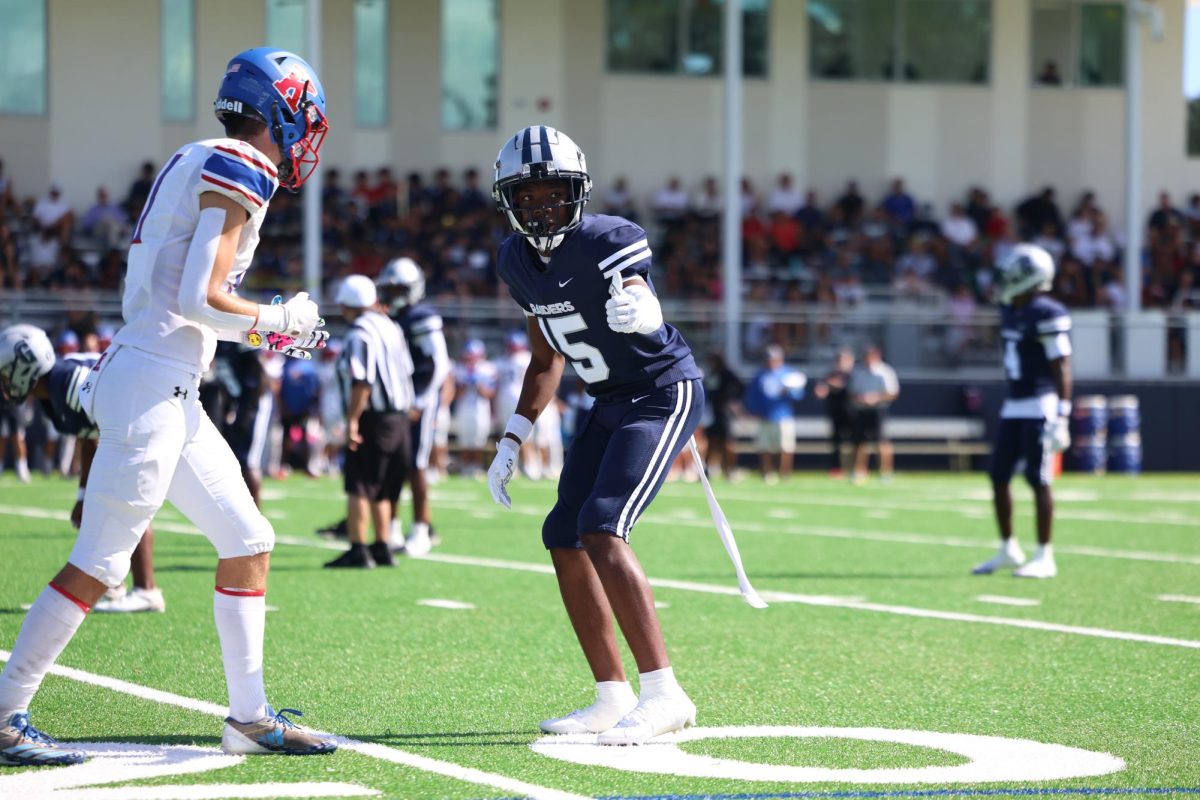 Sophomore defensive back Deandre Leonard lines up before the ball is snapped. Leonard has served the Raiders as their main man to man cornerback taking on the hardest matchups each week. 