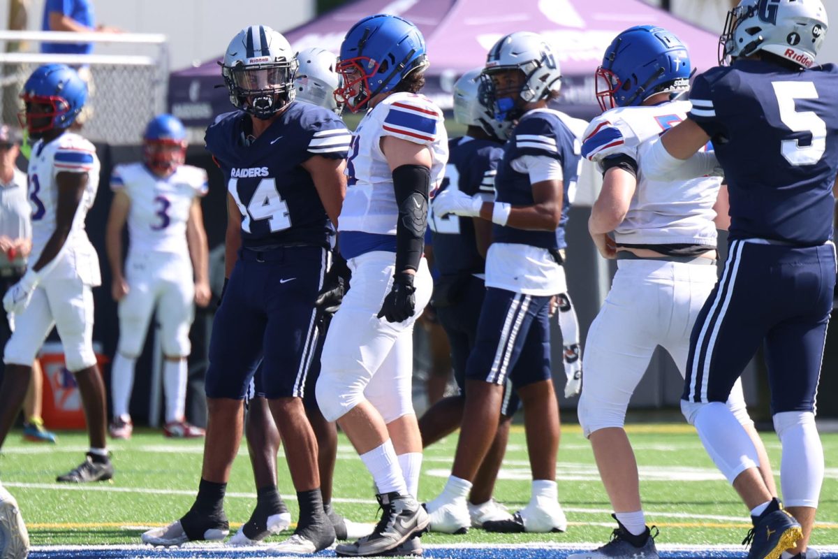 Senior defensive tackle Donovan Hayes flexes after getting a sack. Hayes this season has 11 total tackles while creating two tfl (tackle for loss) and two quarterback hurries according to Maxpreps.