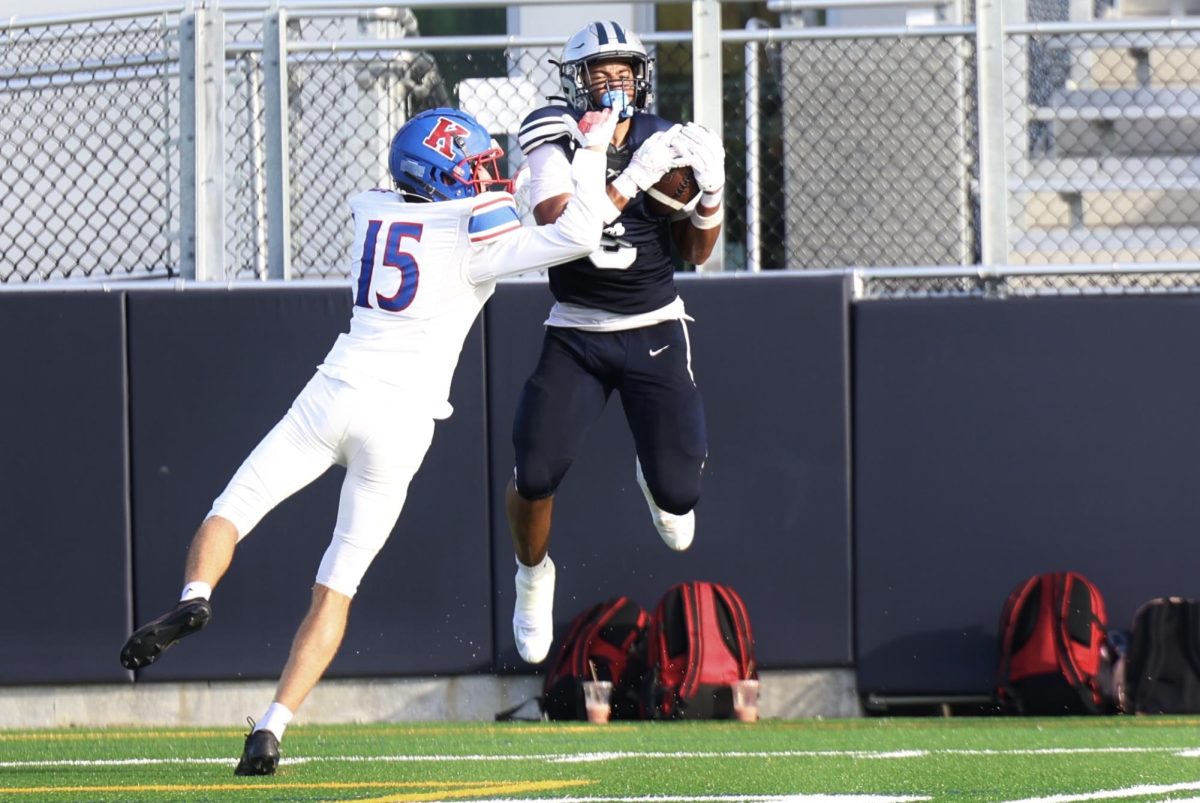 Junior wide receiver Luc Caroll catches the ball near the sideline. Carrol serves as the team slot receiver but is able to be a possession receiver while providing a deep threat down field.  