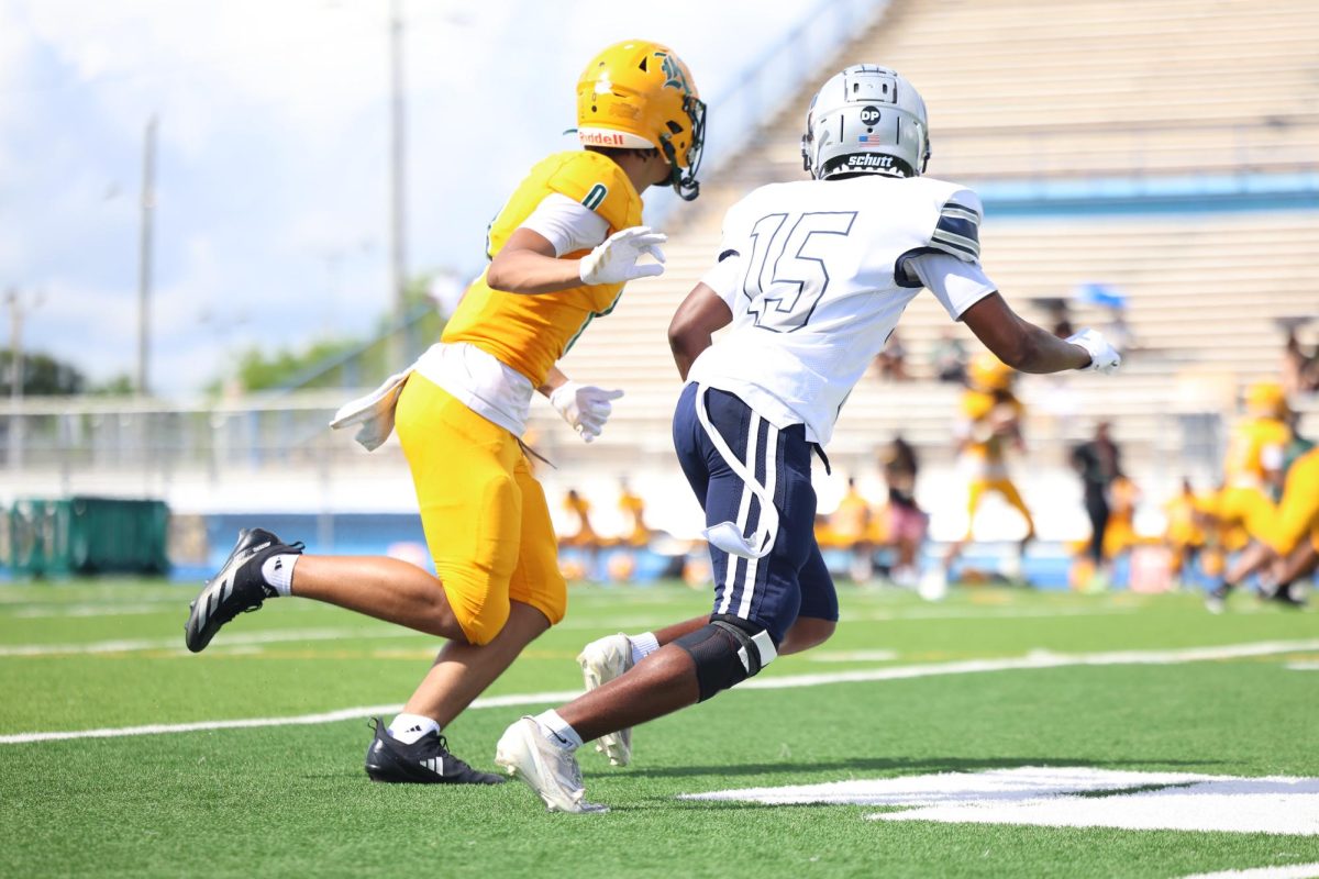 Sophomore Deandre Leonard covers a Killian wide receiver. Along with him being a big piece of the defense he serves as one of the team's punt returners.   