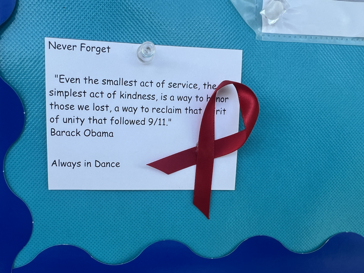 Dance students placed 9/11 remembrance ribbons, continuing the late Gerri Barreras's legacy. English Faculty & Department Chair Dory Guerra and Social Science Department Chair Alex Melchor spearheaded this endeavor. The long-standing tradition was a testament to Ms. Gerri's compassion and love for her community.