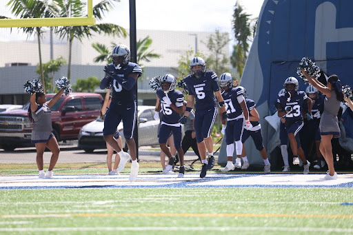 Senior defensive end Julian Terry and junior wide receiver Ryan Beery lead the team out of the tunnel. For the team, the walkout was important as it set the tone before the game started. 
