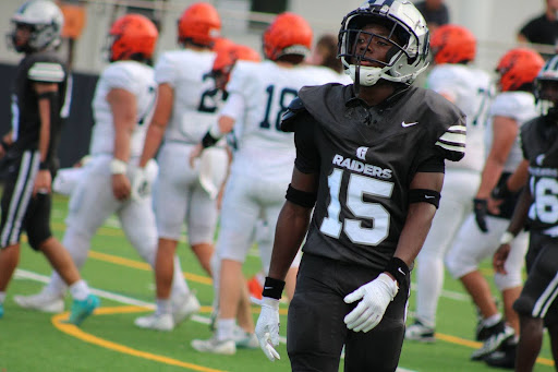 Sophomore wide receiver and defensive back Deandre Leonard walks off the field after a timeout is called. At this point in the game, the Raiders were trailing going into halftime. Leonard had multiple deflections and had a kick return touchdown to keep the Raiders in the game. 