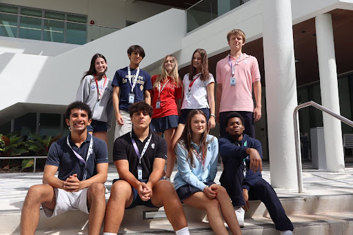 Students show their uniforms following the dress code. Individuals from different grades gathered together in front of the Student Center. They wore their polos, grade t-shirts, school bottoms, IDs, and hoodies.