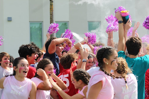 Seniors and sophomores celebrate their win in the first ever Homecoming Powderpuff game against the juniors and freshmen. After an intense and spirit filled match, they were able to bring it home. 