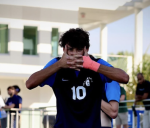 Senior Nicolas Pineros celebrates after scoring a goal playing at Sean Taylor ‘01 Field. The team achieves a clean sweep win and plans to keep up the winning streak throughout the season. The next game the Raiders will play will be at St. Thomas Aquinas today at 3:30 pm.
