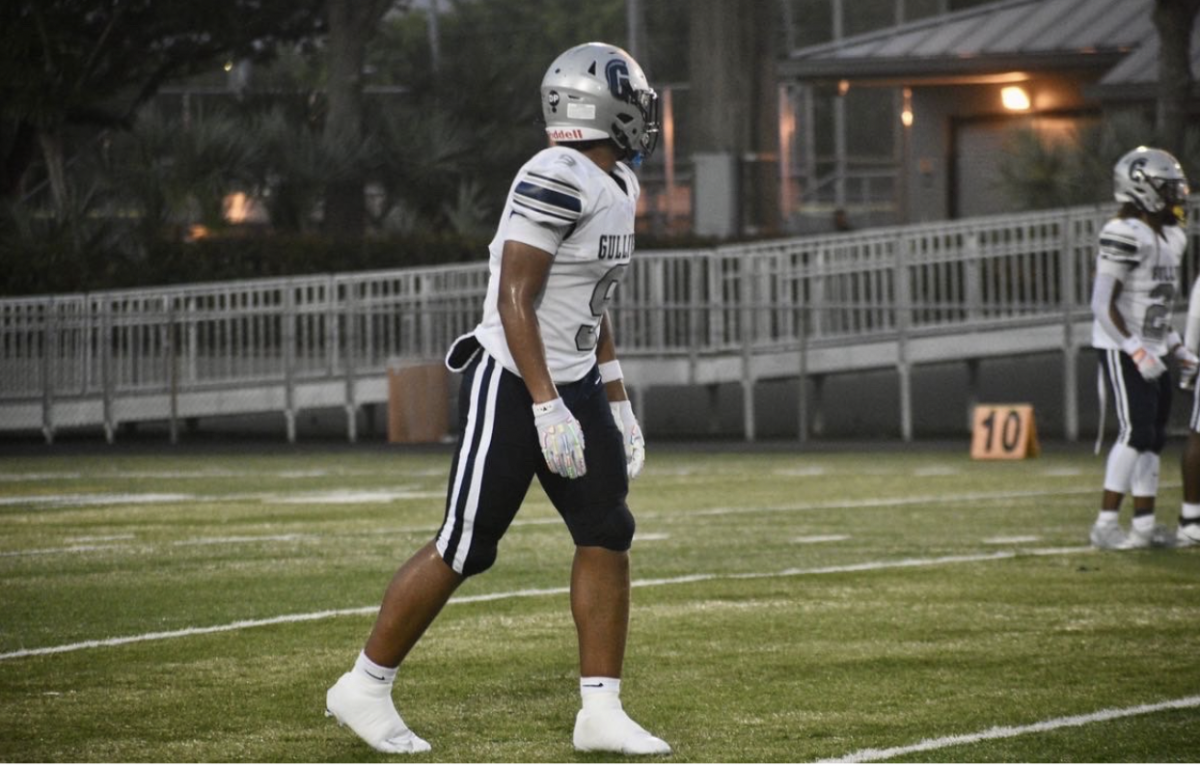 Luc Carroll lines up ready for the offensive play to start. Leading by example—on and off the field. Luc Carroll’s passion, discipline, and leadership make him a force to be reckoned with.
