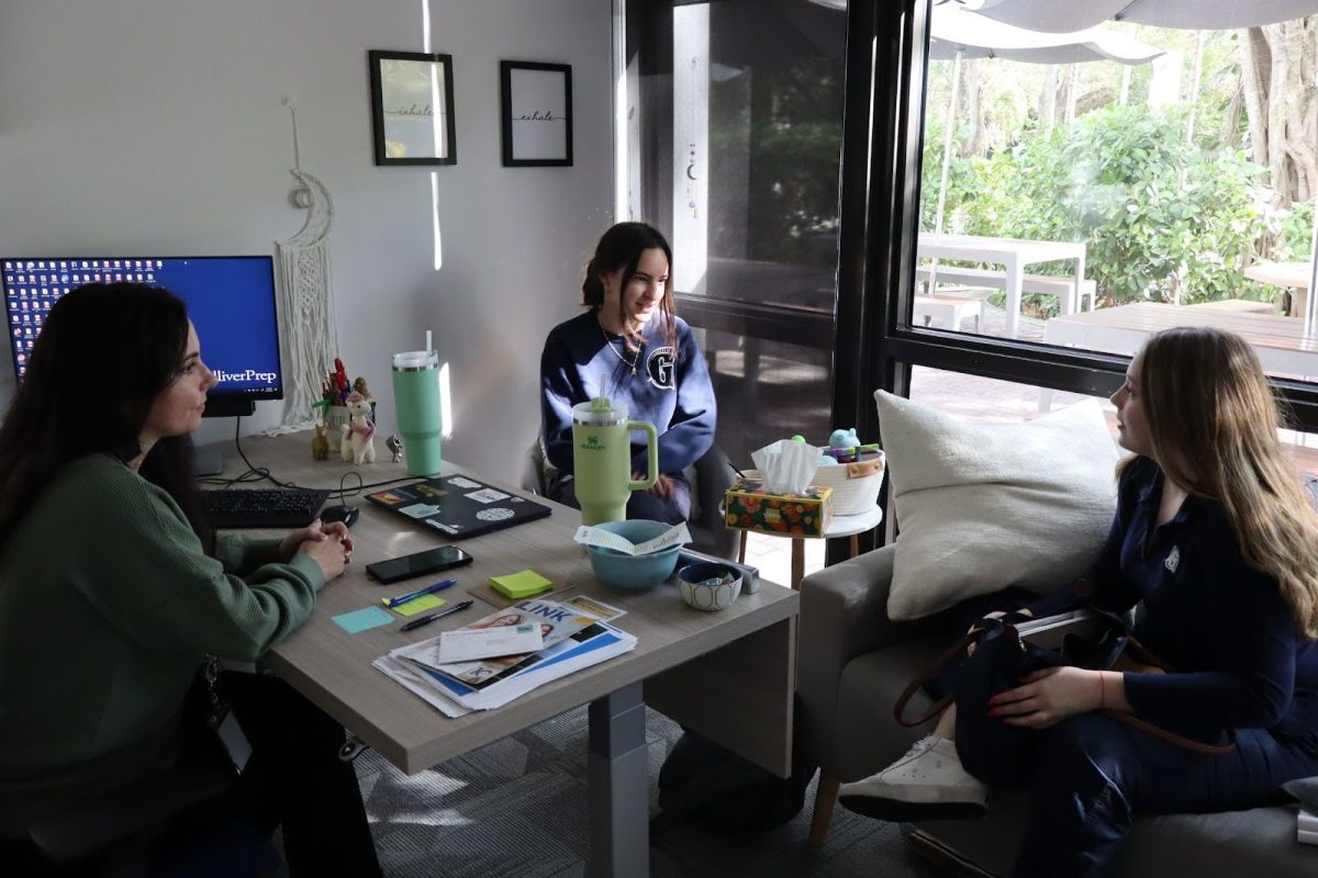 SET officer Mia Solarte ‘27 and member Amanda Lasen, ‘27 meet with sponsor and mental health counselor Renee McEachern. The pair were discussing the club’s upcoming activities surrounding mental health awareness.  