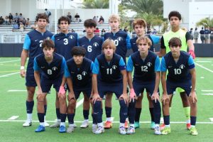 The Raiders' Starting Lineup poses for a pregame photo. According to MaxPreps, the team has a 14-2-2 record and is ranked eighth in the state and 28th in the nation.
