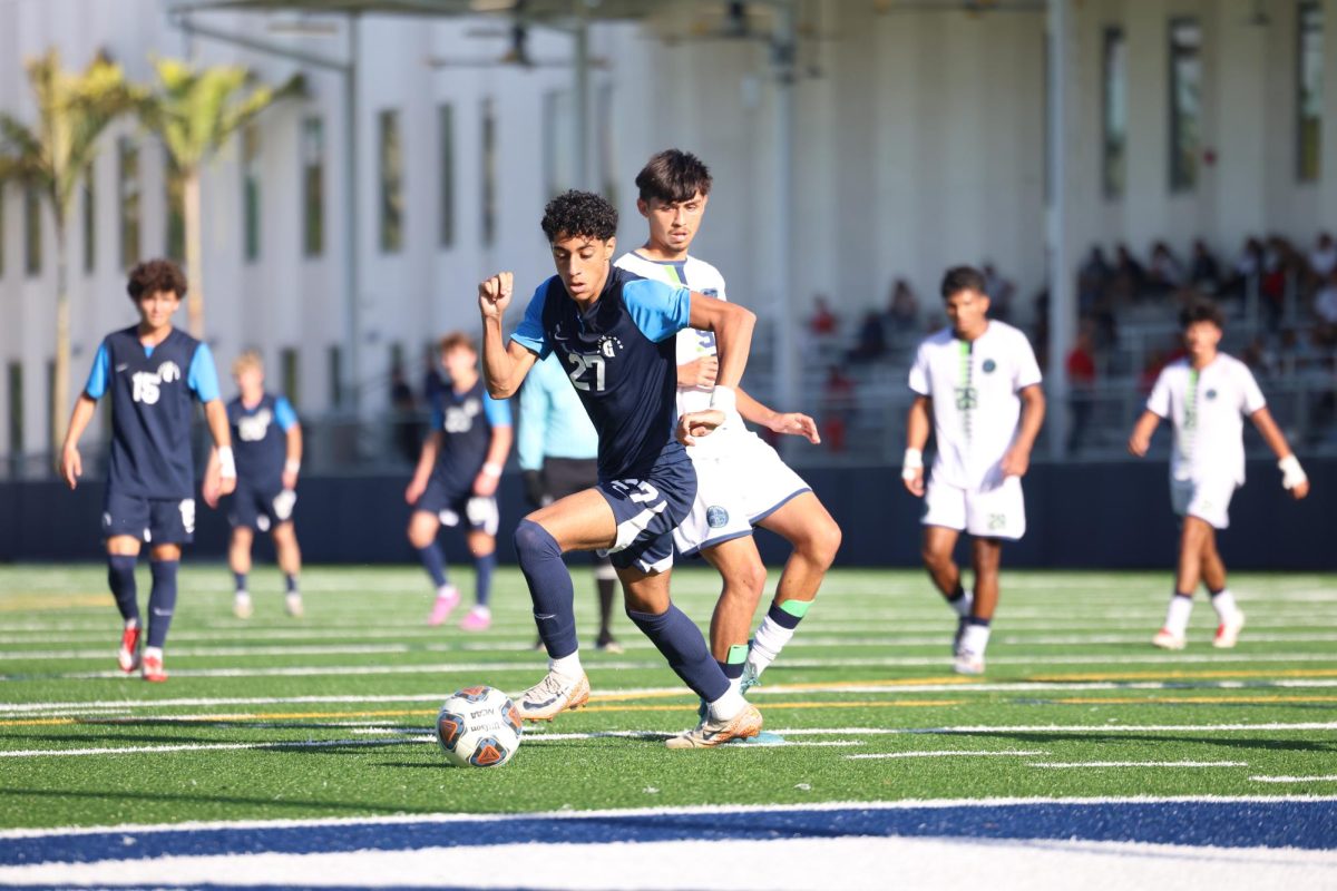 Sophomore forward Youssef Elzomor intercepts a pass from SLAM. Elzomor would substantiated a wrist injury during the game.