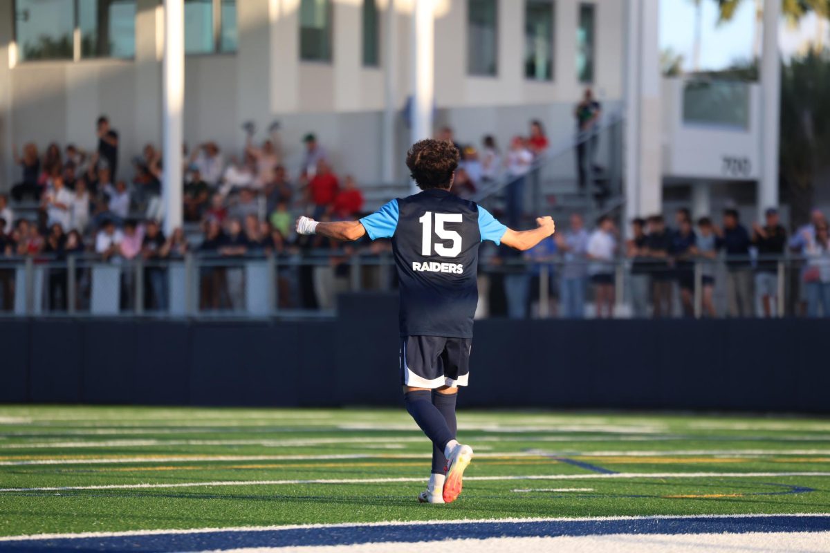 Sophomore midfielder Bruno Ripalda celebrates after scoring a penalty shot.  Ripalda showed great efforts on both sides of the ball during the game.