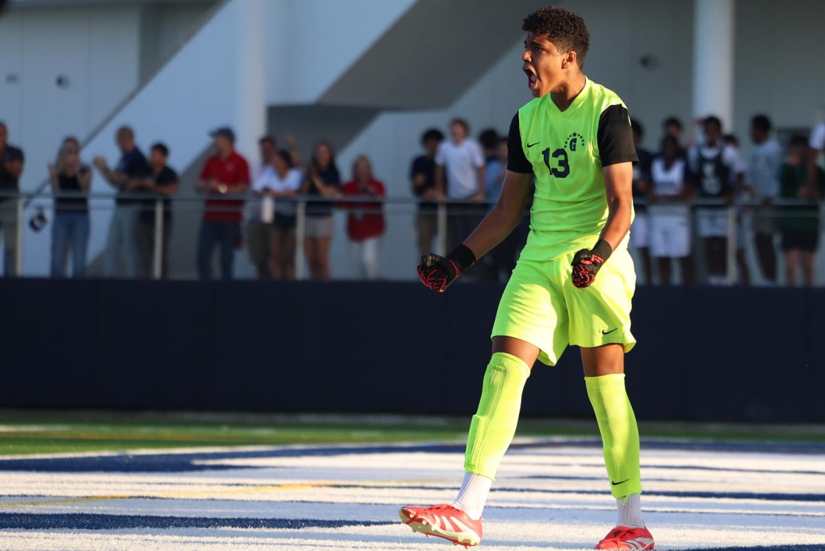 Junior goalie Sonny Garcia celebrates after saving a shot during the first round of penalty shots. Garcia has posted two shutouts this season according to Maxpreps. 