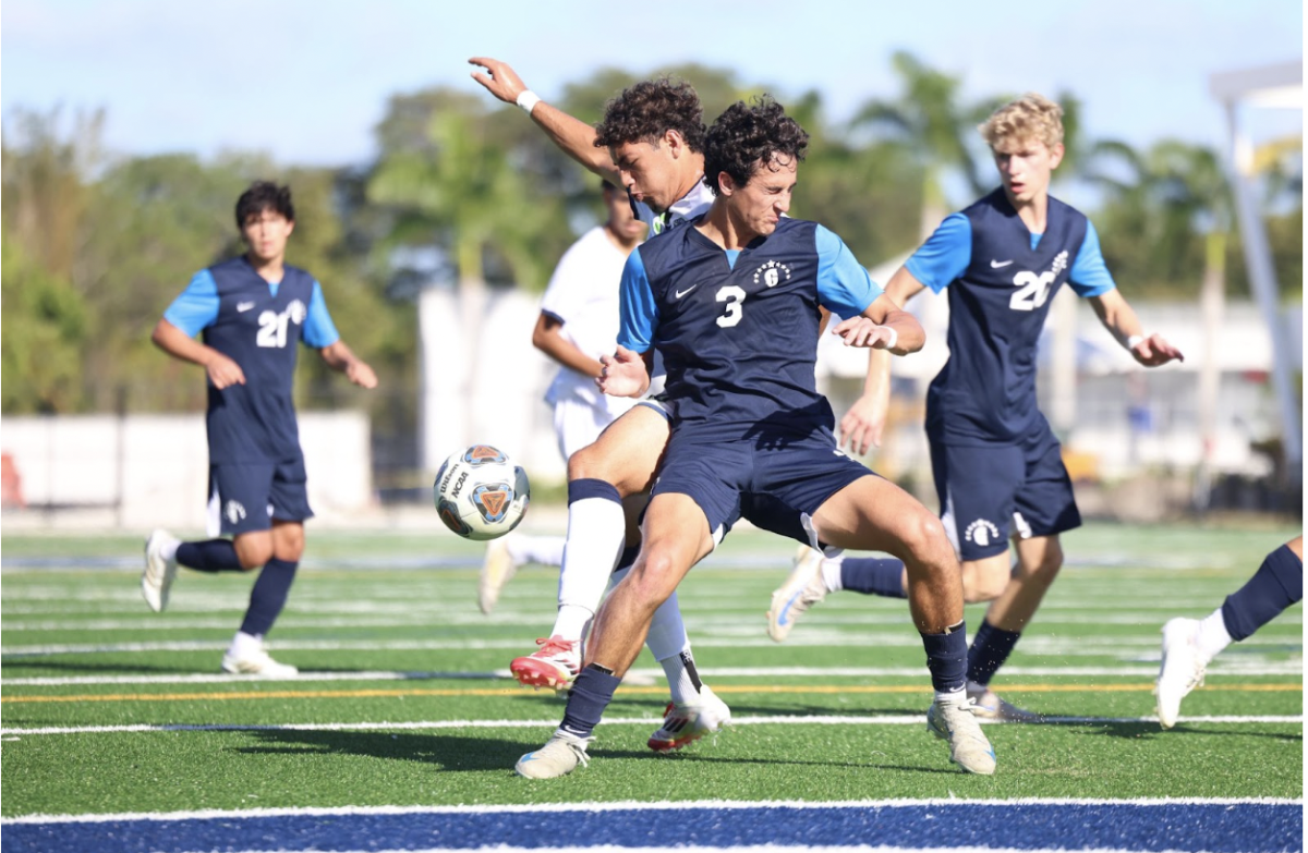 Senior defender Cristian Murciano controls the ball under pressure as the team pushes toward the state championship. Despite the Raiders’ constant effort, their season came to an end in a 3-2 state semifinal loss to American Heritage. 
