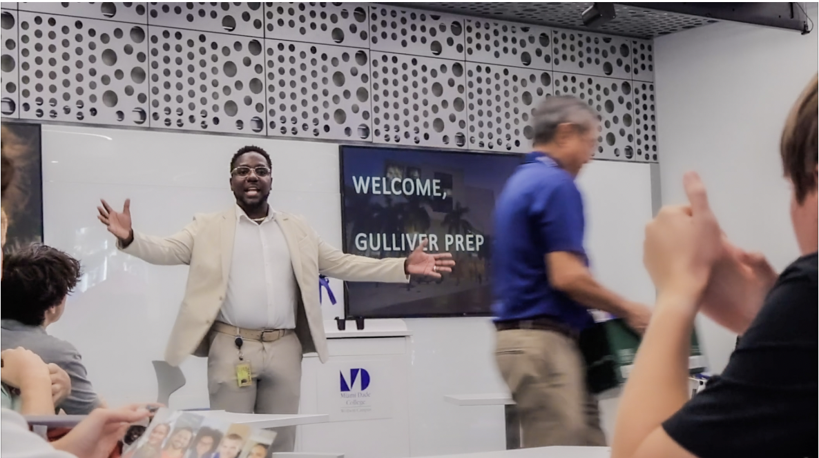 Director of Recruitment James Veard introduces himself to Cybersecurity and Business program students. The experience at Miami Dade College allowed students to hear practical knowledge from the field. Students were able to walk around the Artificial Intelligence Lab and see real-world examples of technology they learned about.