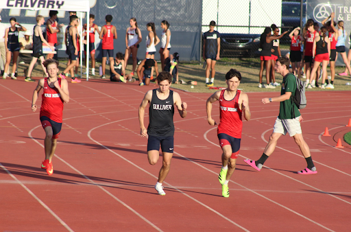 Sophomore, Matias Vidageron, runs the 400m against FAU High School. He sprints his fastest to be able to take the lead.