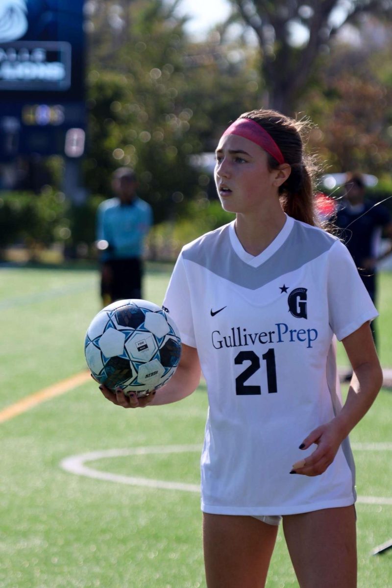 Sophomore Stella Balestrazzi looks for an open teammate to inbound the ball to. Balestrazzi has stepped up as a leader this season helping the team to go to the playoffs despite many key players being injured.  