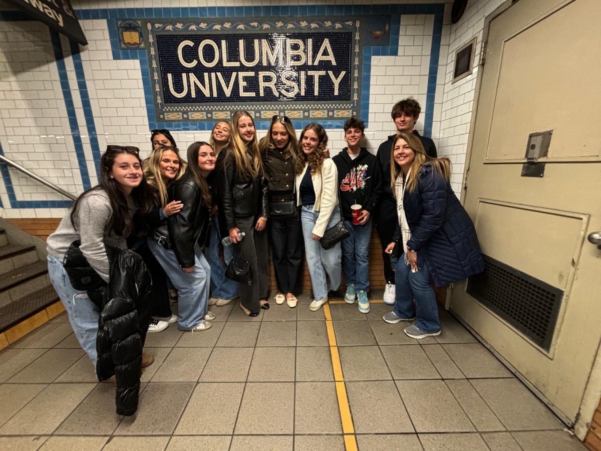 The group poses in front of the Columbia University sign in the subway. In total there was four kids from the yearbook staff, four from the Newspaper staff and two from the principles of journalism class.  