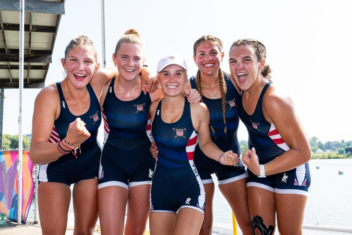 Senior Eden Alfi (4th one to the right) celebrates with her teammates. Alfi has competed on the national stage representing her country and has dreams of competing for team USA in 2032 at Brisbane Australia.   