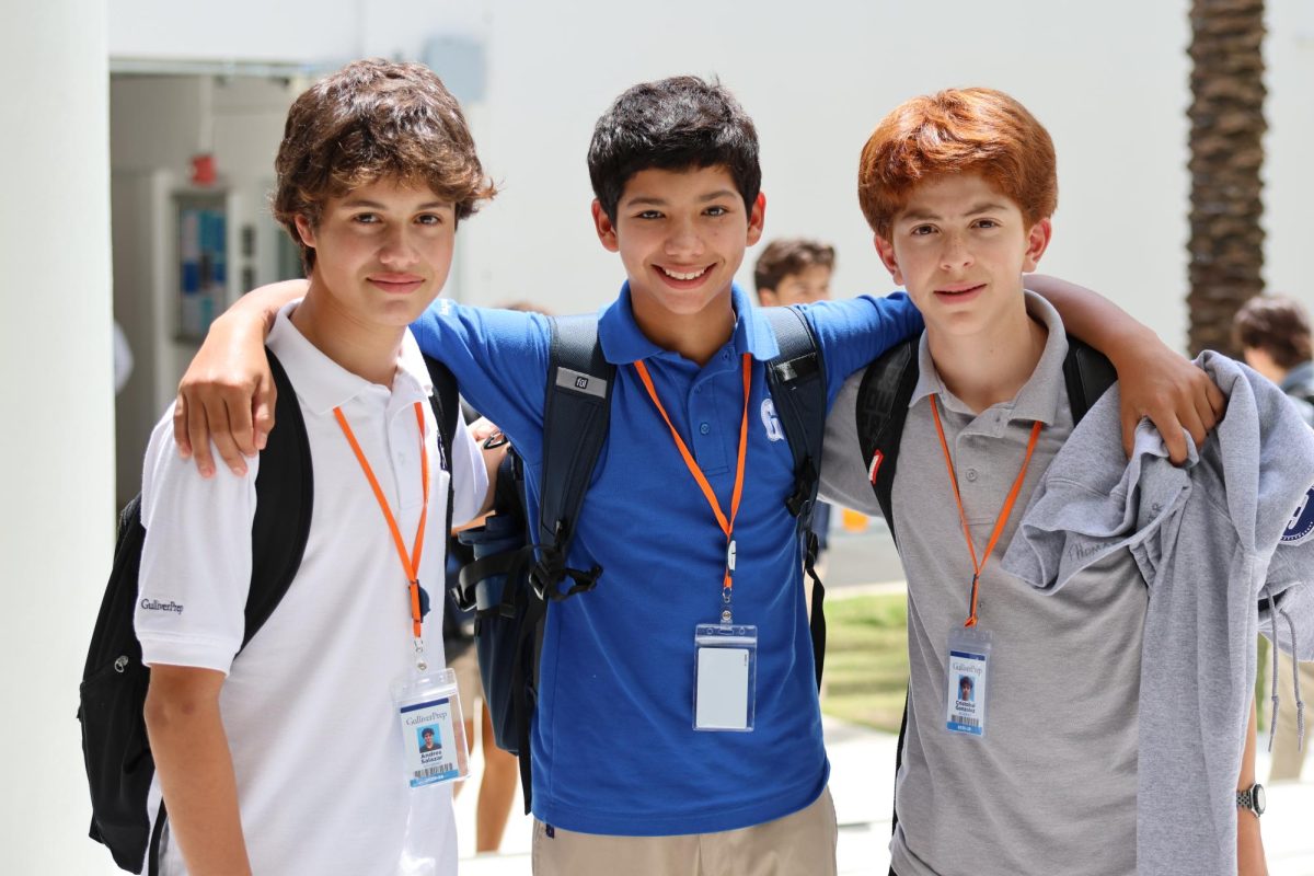 Freshmen Andres Salazar, Thomas Barker, and Cristobal Gonzalez wear their polos and IDs, as required by the school dress code. The new policy restricts cub t-shirts and spirit gear to Fridays. 