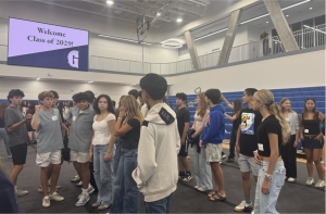 Students were challenged to line up in a straight line from tallest to shortest without talking, making them use other communication skills to collaborate and complete the task. 
