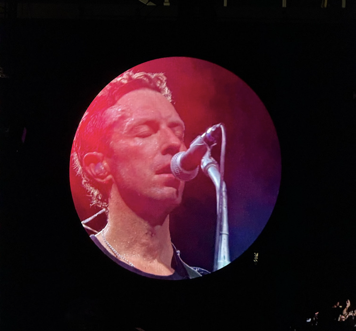 Chris Martin performs during Coldplay’s Music of the Spheres Tour at Hard Rock Stadium on June 27 in front of 60,000 fans. The band delivered an emotional and high-energy performance focused on unity and inclusion