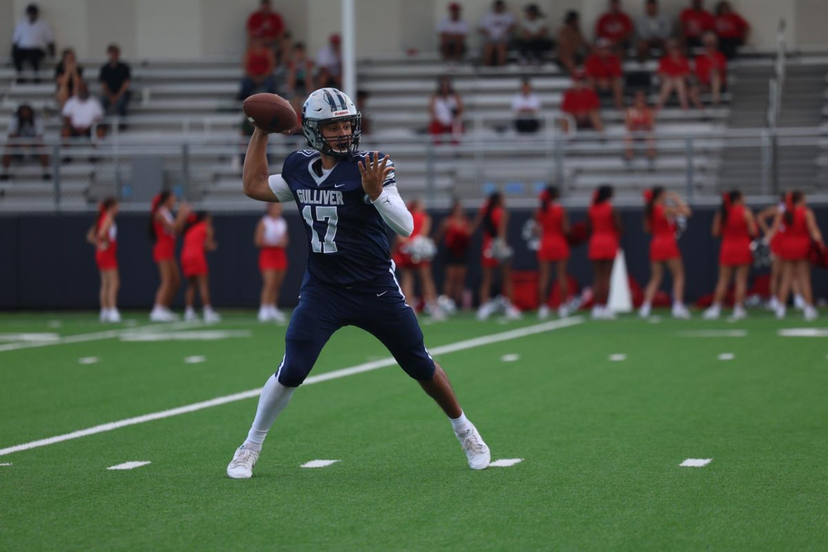 Junior Quarterback Brendan Beery steps back in the pocket and throws a pass. Beery ended the day with two passing touchdowns. 