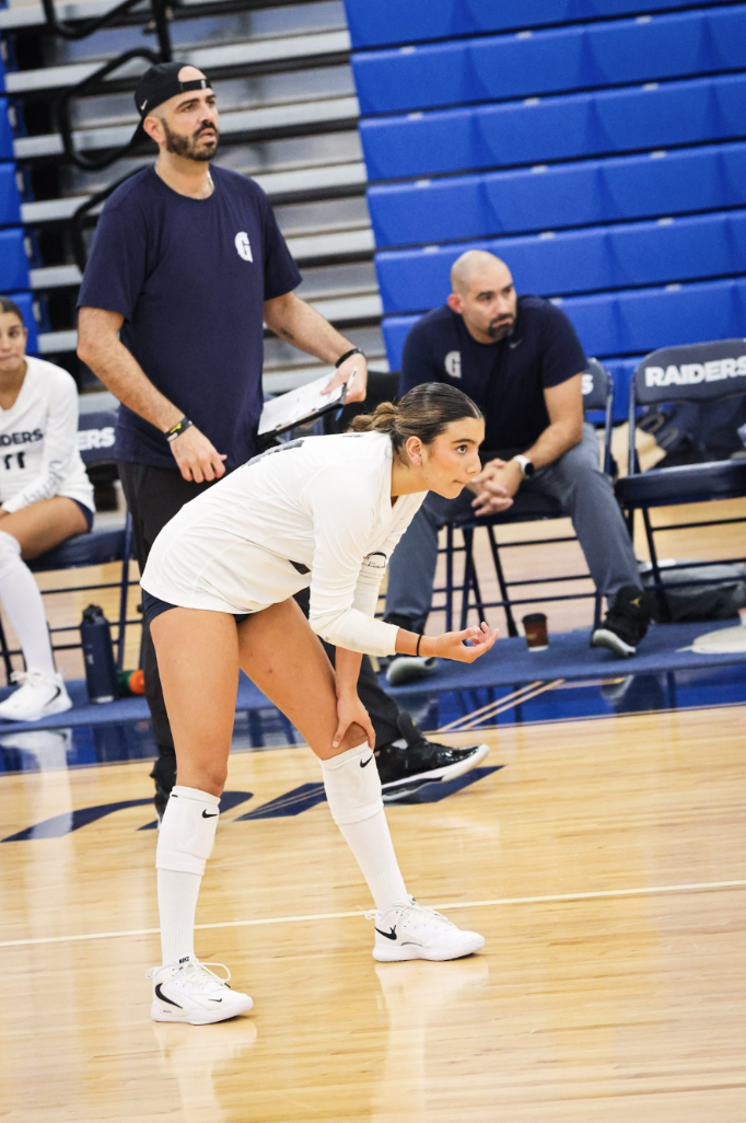 Junior Veda Sharma gets ready to hit the volleyball passed by her teammate. She prepared to dig the ball. “When I am playing in a game, I have to make sure I stay focused so I can cover any part of the court I need to,” Sharma said. 
