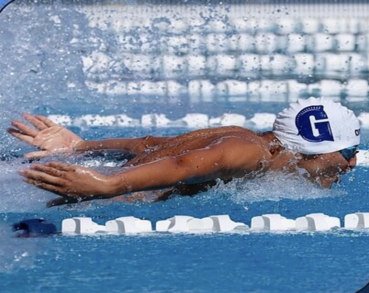  Freshman Eric Macedo performs the butterfly swim technique in a school meet. He looks to improve his time in this event. With hopes of competing in states this season. 