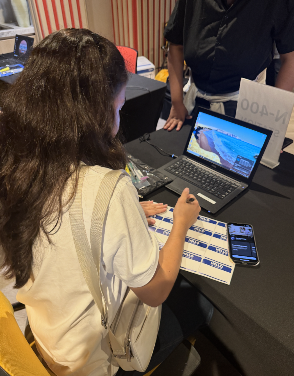 Junior Victoria Tarrazzi completes the N-400 Citizenship Application Form as part of her Raider Impact project. The initiative encourages upperclassmen to engage in service learning by addressing real-world community needs. Through the program, students develop leadership skills while making an impact beyond the classroom.